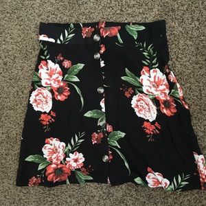 Black floral mini skirt